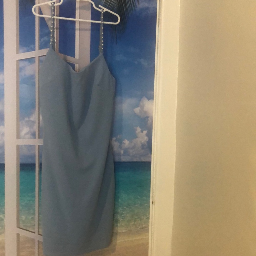 Iris, small, light blue spaghetti strap short dress.